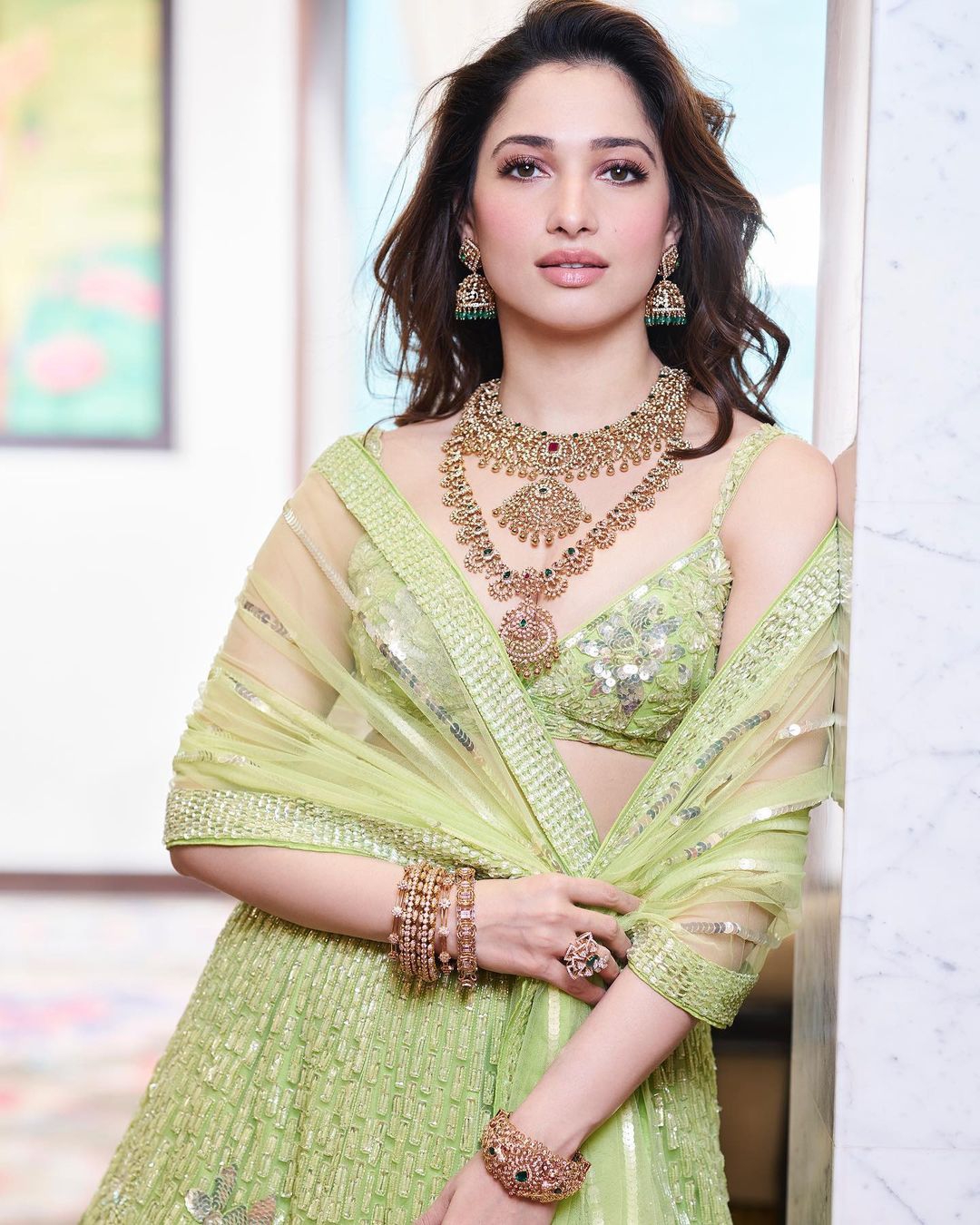 Tamannaah Bhatia, often referred to simply as Tamannaah, was born on December 21, 1989, in Mumbai, Maharashtra, India. She was raised in a Punjabi family with roots in Mumbai. Her father, Santhosh Bhatia, is a diamond merchant, and her mother, Rajani Bhatia, is a homemaker. Tamannaah attended Maneckji Cooper Education Trust School in Mumbai for her primary education before pursuing her higher studies.